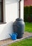 Rainwater barrel downspout modern design house exterior