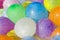 Rainwater over colored balloons
