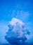 The rainy cloud Cumulonimbus rises high up into the sky