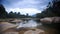 Rainy Clouds Motion over River between Rocky Banks in Vietnam