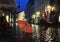 Rainy Evening In Old Town of Tallinn, Estoni travel to Europe, people walking on the street under umbrellas