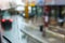 Rainy glass and street lights in background.