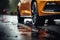 Rainy road drama Car tires navigate wet terrain, close up focus