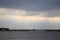 Rainy seascape. View through Kupecheskaya harbor towards the battery of Knyaz Menshikov and Fort Emperor Pavel 1