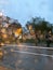 Rainy windshield of a car at the unrecognizable pedestrians