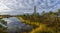 Raised bog and marsh landscape under an expressive sky