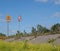 Raised coastal road along the ribble estuary near southport merseyside with turning and speed limit traffic signs