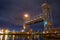 Raised double-deck drawbridge at night