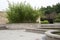 Raised potting bamboo bed, fountain arranged in the park