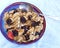 Raisin bran breakfast cereal with blackberries blueberries strawberries