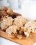 Raisin walnut crispy cookies and glass of milk.