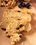 Raisin walnut crispy cookies on wooden background.