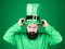 The raising of the green. Hipster in leprechaun costume touching hat. Irish man with beard wearing green. Bearded man