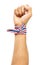 Raising up fist with Thai national color cloth tied around wrist on white background with clipping path