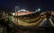 Rajamangala Stadium in Bangkok,Thailand.Downtown city in twilight with reflection on July 14, 2015.