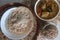 Rajamudi rice appam served with kerala chicken curry