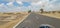 Rajasthan National Highway a white line traditional Thar Desert power line and power wire sky and clouds landscape nature