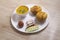 Rajasthani Traditional Cuisine Dal Baati Also Know as Dal Bati or Daal Baati Churma on Wooden Background. It is popular in