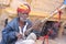 Rajasthani traditional folk artist playing ravanahatha violin at Jaisalmer fort