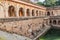 Rajon Ki Baoli step well in the Mehrauli Archaeological Park in Delhi, Ind