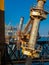 Raked pile gates hold a large pile in place during construction of a wharf