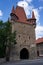 Rakovnik, Czech Republic - July 2, 2022 - the Gothic Prague tower from the 15th century on a sunny summer afternoon