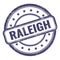 RALEIGH text on indigo blue grungy vintage round stamp