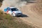 Rally Car in a Turn and a Cloud of Dust 21