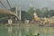 Ram Jhula hanging bridge, Rishikesh, India. The river Ganges