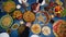 Ramadan iftar Eid. Muslim family has dinner at home. Table with traditional food. Eid al-Fitr celebrations