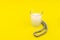 Ramadan Kareem Festival. Candle and rosary on yellow background. Happy ramadan hoilday. Copy space