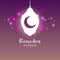 Ramadan Kareem lettering text greeting card. Crescent and retro lamp silhouette on background of night sky