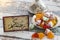 Ramadan kerim text in arabic on vintage table with candies