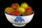 Rambutan Fruits in White Bowl on Black Background