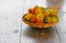 Rambutans fruit in basket on a wood desk background