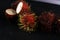 Rambutans fruit with leaf on table. Rambutan or hairy lychee
