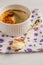Ramekin with creme brulee and spoon in the middle
