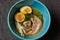 Ramen bowl with soft boiled eggs and pork belly