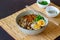 Ramen soup with noodles, pork, mushrooms and eggs. Japanese cuisine. Recipe