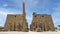 Rameses II Pylon and with statues and obelisk, the main entrance for  the Luxor Temple in Luxor, Egypt.