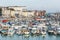 RAMSGATE, ENGLAND - OCT 30 2019 Yachts moored in the marina of the impressive historic Royal Harbour