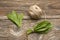 Ramson bear garlic bunch tied with rope on old wooden background.