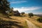 ranch house with panoramic view of valley and rolling hills