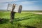 A ranchers old metal mailbox with a bridle wrapped around it in rural Saskatchewan, Canada