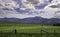 Ranching farm along the Eastern slopes of the Canadian Rocky Mountains and future coal mining development