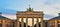 Randenburg gate illuminated at sunset , Berlin Germany