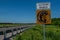 Randolph County, IL--June 13, 2020; red and back highway sign with image of American Penny marks road as part of Historic Lincoln