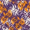 Random bright seamless pattern with foliage silhouettes. Leaves branches in white and orange colors on purple background with