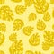 Random bright summer seamless pattern with yellow monstera ornament. Pastel background