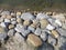 Random large stones decoration on a muddy field